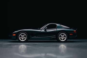 Sleek Black Sports Car Against a Dark Background in Studio Lighting