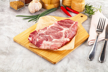 Raw pork neck steak for grill