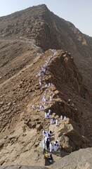 Arafat Mountain Ascent: Pilgrims Journey to the Sacred Summit of Arafat