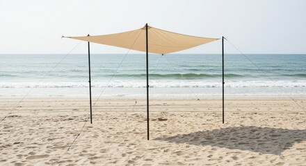 Fototapeta premium Tan Beach Canopy Shade on Sandy Shore