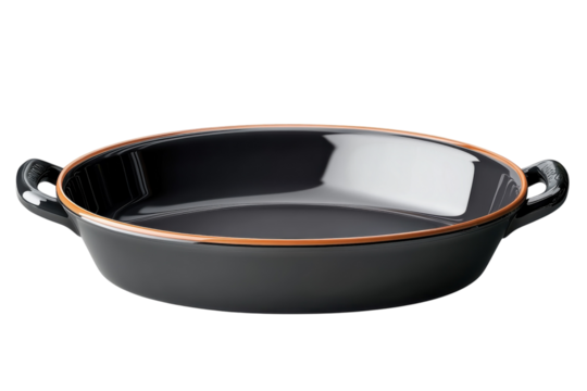 An elegant black ceramic baking dish ready for a cozy family meal with a copper colored trim on transparent background
