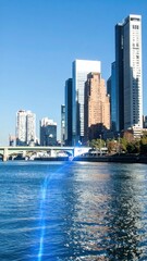 Naklejka premium Magical City Skyline with Flowing Energy Between Stunning Buildings