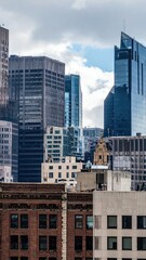 Obraz premium Urban Skyline with Varied Textures of Glass, Steel, and Concrete