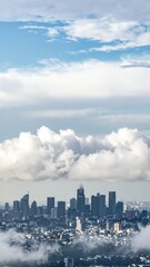 Urban Skyline with Contrast Between Clouds and City Structures