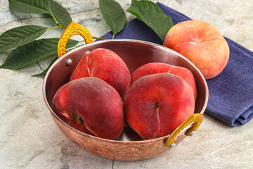 Ripe sweet and juicy Flat peach