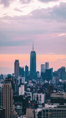 Fototapeta premium Vibrant City Skyline at Sunset Showcasing Colorful Atmosphere