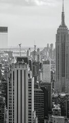 Naklejka premium Tall Thin Buildings in City Skyline with Vertical Focus and Depth