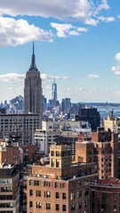 Fototapeta premium Urban Skyline View Showcasing Diverse Architectural Styles and Eras
