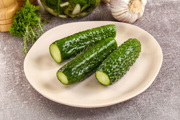 Homemade lighty salted cucumbers with herbs