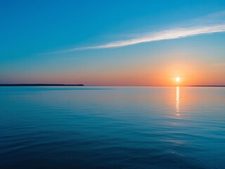 Fototapeta premium Serene Sunset Over Calm Waters, Reflecting Sunlight and a Peaceful Horizon View.