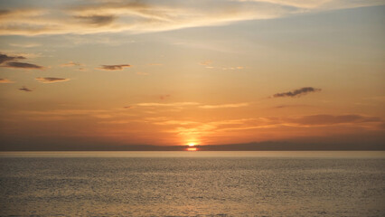 Landscape image of a beautiful sunset sky and the sea