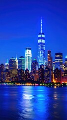 Obraz premium New York City Skyline at Night with Iconic Skyscrapers and Lights