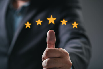 A confident person giving a thumbs-up, highlighted by five golden stars above, symbolizing approval and high ratings.