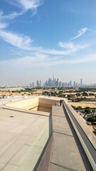 Rooftop View of Futuristic Skyscrapers Overlooking Dubai Desert