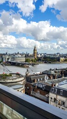 Fototapeta premium Rooftop View of Historic Landmarks and River Thames in London