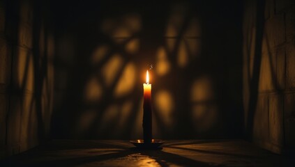  Single lit candle in a dark, empty room creates a warm glow and a sense of solitude, evoking reflection and serenity in a mysterious atmosphere