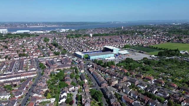 Aerial view of distant football Stadium, Merseyside &ndash; historic homes, leafy streets, and urban charm captured in high-resolution drone photography. Ideal for editorial, real estate, and travel use.