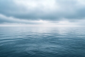 Obraz premium Moody expanse Cloudy sky over calm ocean