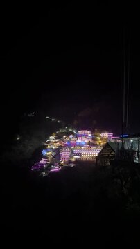 Colourful lights on the building on mata vaishno devi temple in night. Holy shrine of goddess vaishno.