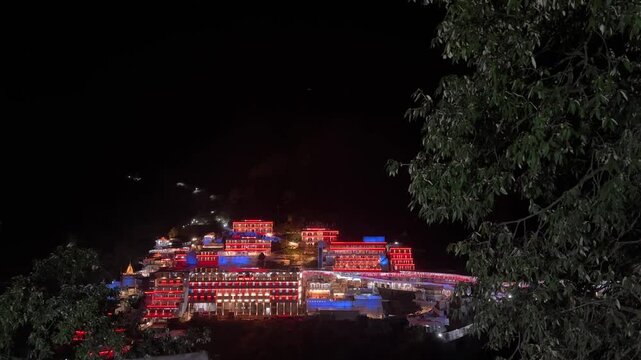 Colourful lights on the building on mata vaishno devi temple in night. Holy shrine of goddess vaishno.