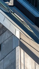 Obraz premium Light Interaction on Rooftop Surfaces with Modern Architectural Design