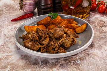 Baked shredded pork with potato