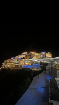 Colourful lights on the building on mata vaishno devi temple in night. Holy shrine of goddess vaishno.