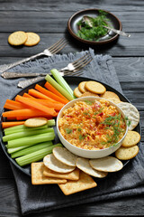 pimento cheese dip served with crackers, veggies