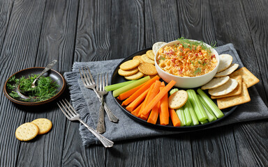 pimento cheese dip served with crackers, veggies