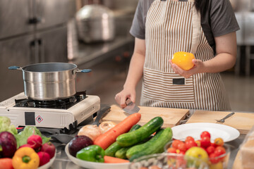 Culinary masterclass chef prepares fresh ingredients in professional kitchen environment