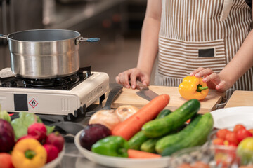 Chef prepping fresh ingredients in a modern kitchen culinary arts vibrant environment close-up view