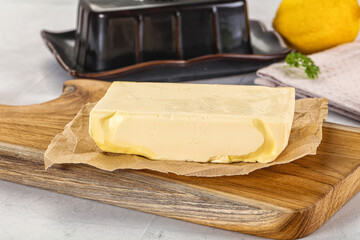 Dairy butter piece over board