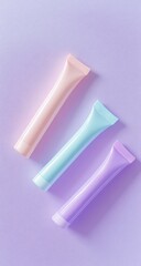 Pastel-colored tubes of cosmetic product arranged diagonally on a lavender background