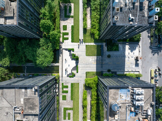 aerial view green city with tree around modern office building © zhu difeng