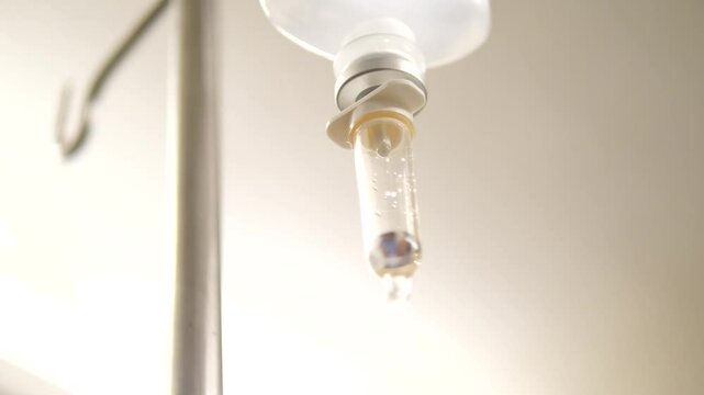 Close-up of IV drip in hospital for patient treatment