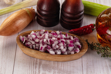 Diced red onion in the bowl