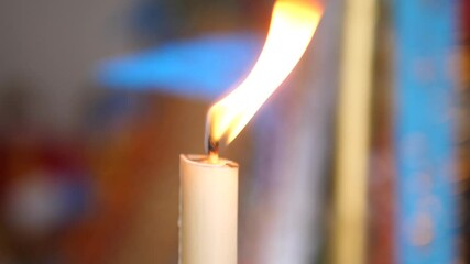 Close Up Candle Flame Flickering in the Dark with Soft Bokeh Background - Powered by Adobe
