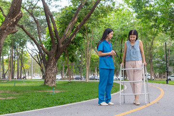 Fototapeta premium doctor gives an elderly person cane practice walking after an accident and being unable walk requiring. doctor wants her practice walking with cane because it will help her walk normally again.