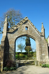 Fototapeta premium Ornate stone gateway at the entrance of a country estate