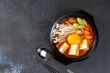 ‘Kimchi Jjigae’ or Kimchi Soup with Soft Tofu or Korean Kimchi Stew - Korean Food Traditional Style