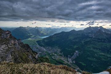 Panorama of Näfels, Mollis and Weesen with clouds in spring in the canton of Glarus in Switzerland