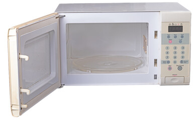 Obraz premium Empty open microwave on isolated background. 
