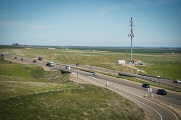 The Interstate Five, I-5, Highway through farmland in Northern California, USA.