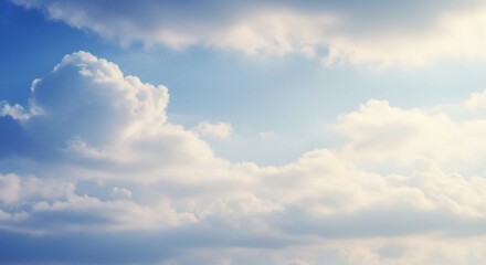 Fototapeta premium Serene Cloudscape: A Dreamy Blue Sky with Puffy White Clouds