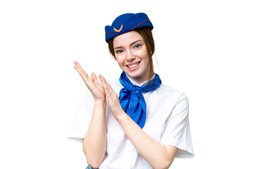Airplane stewardess over isolated chroma key background applauding after presentation in a conference