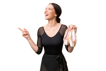 Young caucasian woman practicing ballet over isolated background pointing finger to the side and presenting a product