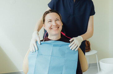 Middle-aged woman, teeth and dentist for dental care, appointment or checkup at clinic. Tooth whitening, cleaning or oral, mouth and gum care at hospital. Soft focus. Part of a series. Close-up.