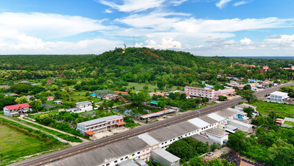 Buriram's Pride. Phra Suphattharabophit and the Stunning Landscape of Khao Kradong, buddha statue in thailand.