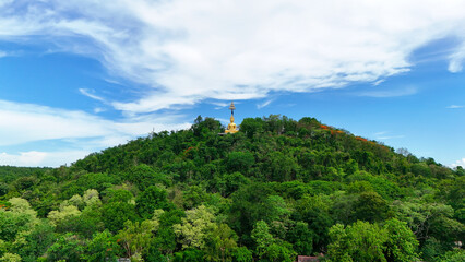 Buriram's Pride. Phra Suphattharabophit and the Stunning Landscape of Khao Kradong, buddha statue in thailand.