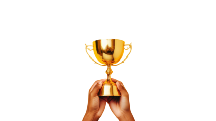 Hand holding a shiny trophy cup award symbolizing victory, achievement, and success isolated on white background